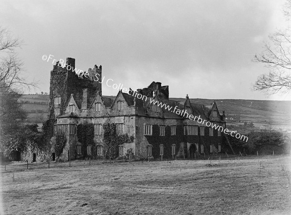 CARRICK CASTLE WHERE DERMOD O'HURLEY WAS CAPTURED 1592 FROM N.W. FROM GARDEN